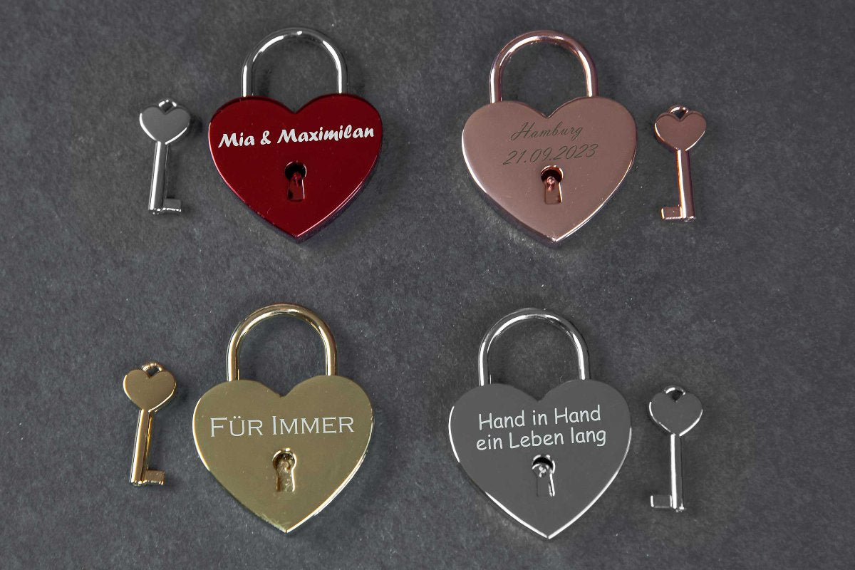 Liebesschloss mit Gravur personalisiert in Herzform in vier Farben